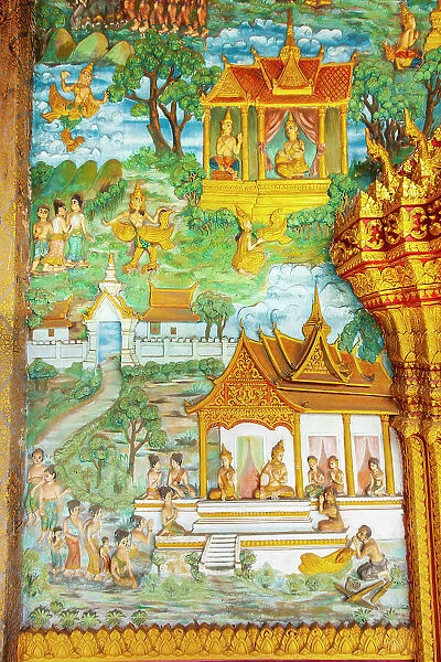 Luang Prabang, Laos. Ancient mural carvings in Wat Mahathat facade