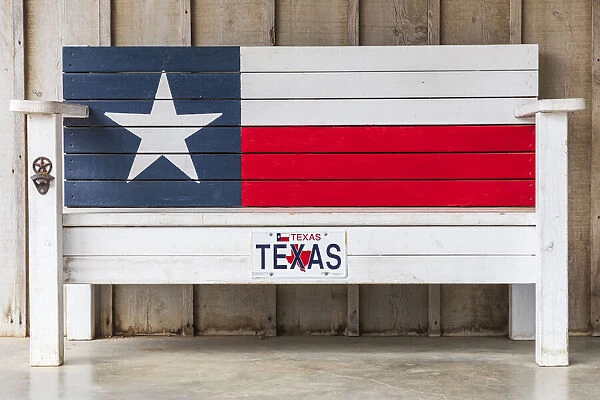 Luckenbach, Texas, USA. Bench painted like the Texas flag. (Editorial Use Only)