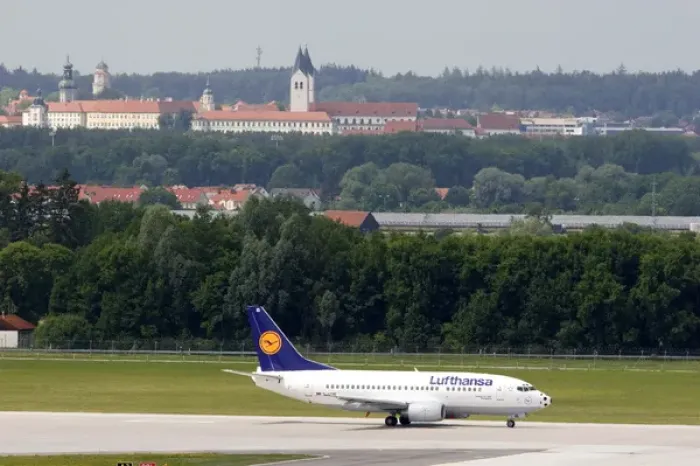 Framed Print : Lufthansa Boeing 737 airplane landing at Munich airport, Germany