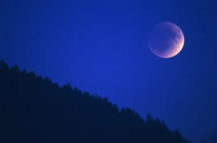 Framed Print : Lunar Eclipse over forest, Zug, Switzerland Framed Print : Lunar Eclipse over forest, Zug, Switzerland
