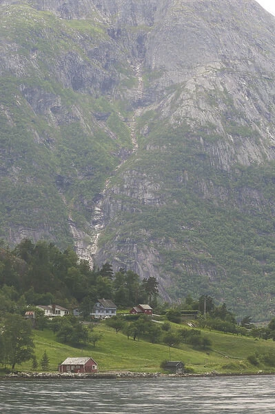 the magnificant Eidfjord valley church nesteld in the Hardanger Fjord