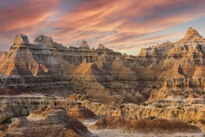 Framed Print : Magnificent set of striated hoodoos set against the backdrop of sunset colors in the sky Framed Print : Magnificent set of striated hoodoos set against the backdrop of sunset colors in the sky