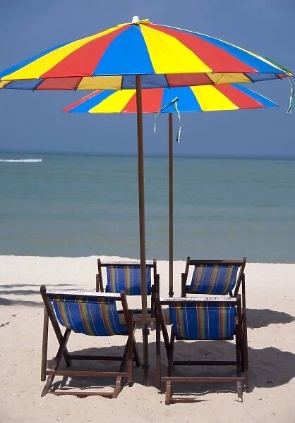 Malaysia, Island of Penang, Golden Sands Beach Resort. Resort beach with colorful umbrellas