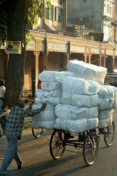 Man pushing an overloaded cart, Jaipur, Rajasthan, India