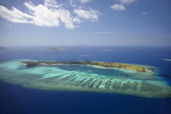 Mana Island and coral reef, Mamanuca Islands, Fiji, South Pacific - aerial