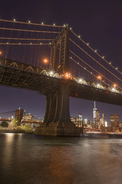 The Manhattan Bridge and Manhattan skyline in the evening light from Brooklyn Bridge Park