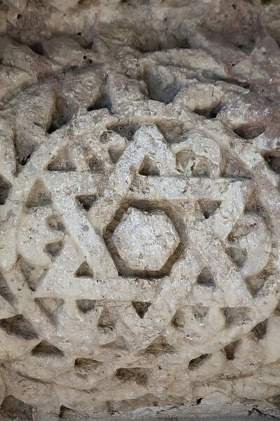 Detail of marble Star of David at site of ancient Jewish temple in Capernaum