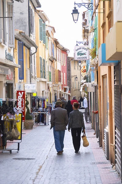 A market street in the old town, people walking on the street Sanary Var Cote daaAzur