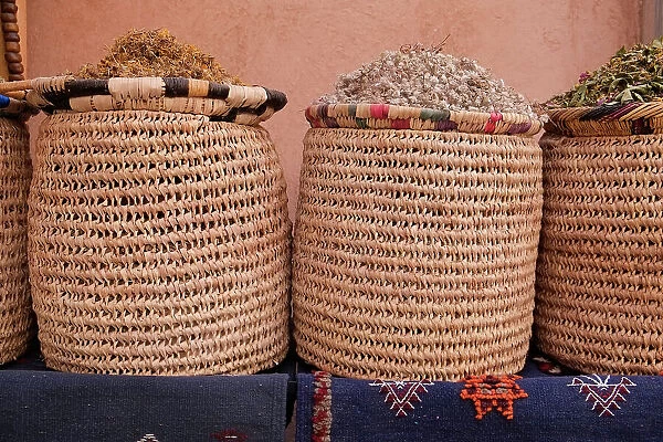 Marrakech, Morocco. Baskets of herbs and teas for sale in the medina