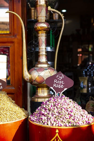 Marrakech, Morocco. Rose tea leaves and a brass teapot