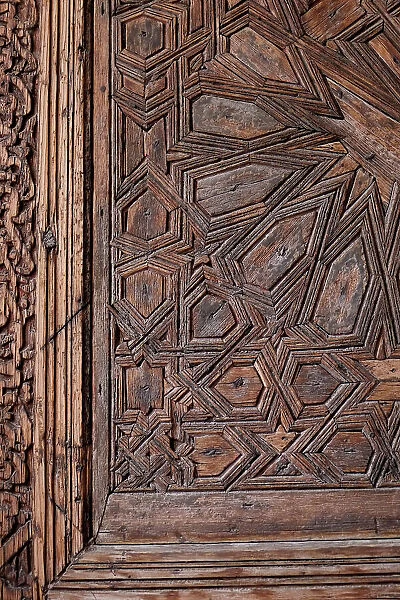 Marrakech, Morocco. The Saadian tombs which is the famous royal necropolis from the 16th century. Carved door
