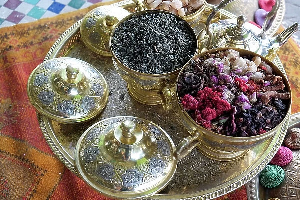 Marrakech, Morocco. Tea set with herbs, flowers and spices