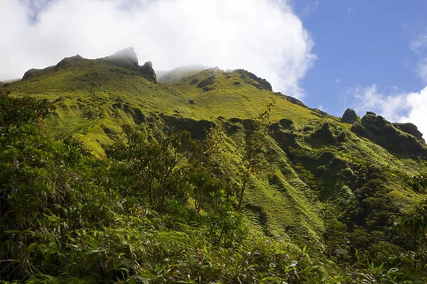 MARTINIQUE. French Antilles. West Indies. Clouds blow through crags below summit of Mt