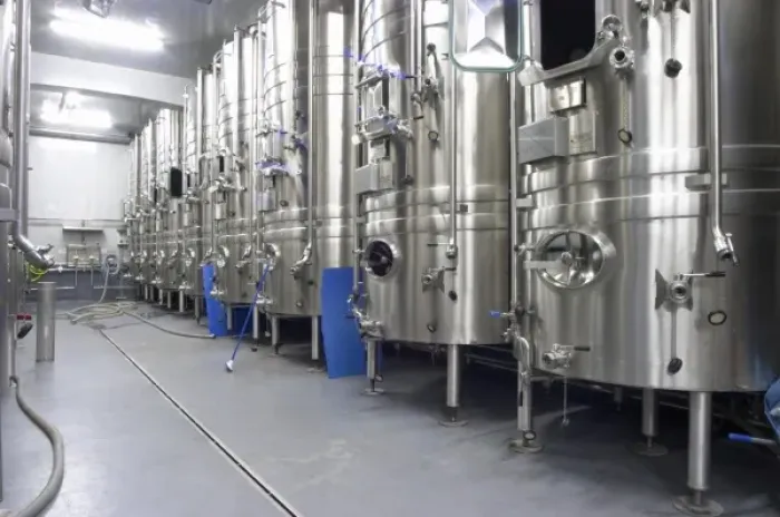 Framed Print : Mas La Chevaliere. near Beziers. Languedoc. Stainless steel fermentation and storage tanks