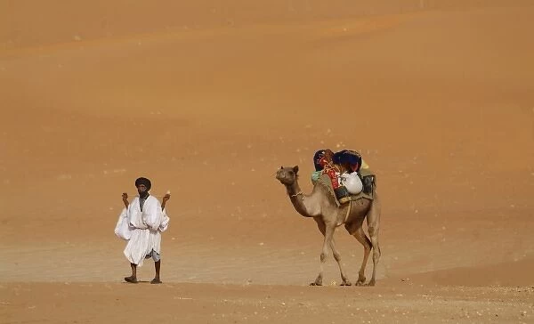 Mauritania, Route Espoir, Boutuilimit, A man with his dromedary