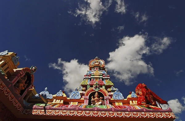 Mauritius, Bambou, low angle view of colorful spire of a Hindu temple with the figurines