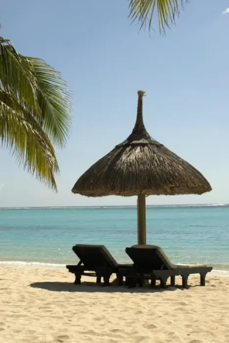 Framed Print : Mauritius. Idyllic beach scene with umbrella, chairs and palm fronds Framed Print : Mauritius. Idyllic beach scene with umbrella, chairs and palm fronds