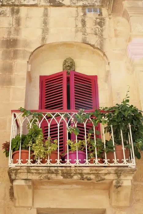 Framed Print : Mdina, Malta. Beautiful rose colored shutters on a window found on the streets of Mdina. (Editorial Use Only) Framed Print : Mdina, Malta. Beautiful rose colored shutters on a window found on the streets of Mdina. (Editorial Use Only)