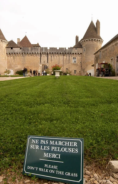 The medieval Chateau de Rully in Cote Chalonnaise, Bourgogne. Sign: don t walk