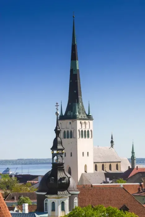 Framed Print : Medieval town walls and spire of St. Olav church, view of Tallinn from Toompea hill Framed Print : Medieval town walls and spire of St. Olav church, view of Tallinn from Toompea hill