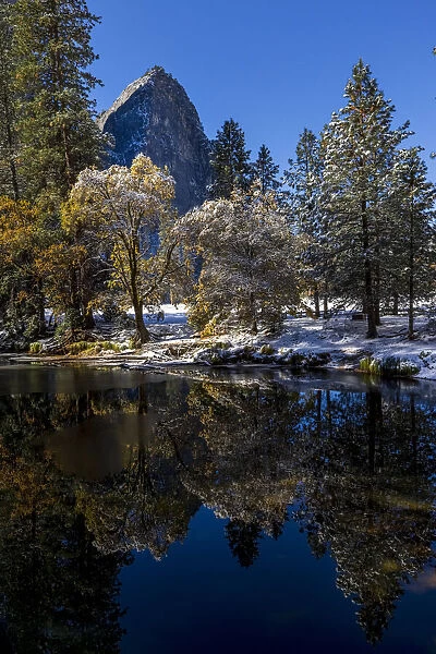 Merced River. Autumn first snow in Yosemite National Park, California, USA