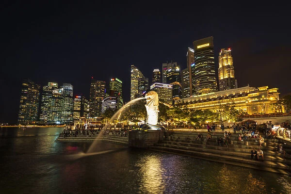 Merlion fountain and business district at night, Singapore