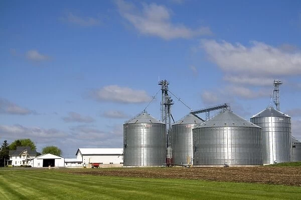 Metal grain storage bins on a farm in Sauk County, Wisconsin, USA