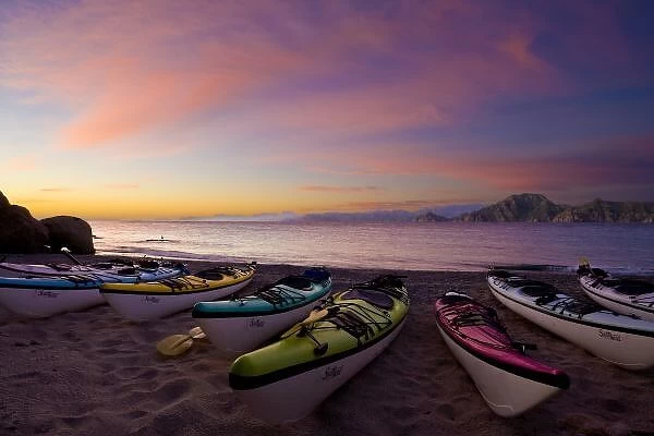 Mexico, Baja, Sea of Cortez. Sea kayaks and sunrise, Isla Carmen