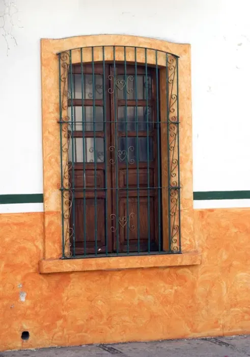 Framed Print : Mexico, Cabo San Lucas. Detail of colorful wooden window with decorative wrought iron bars Framed Print : Mexico, Cabo San Lucas. Detail of colorful wooden window with decorative wrought iron bars