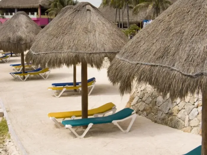 Framed Print : Mexico, Costa Maya. Beach palapas and lounge chairs in village