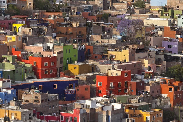 Mexico, Guanajuato. Colorful homes line the streets of this hilltown