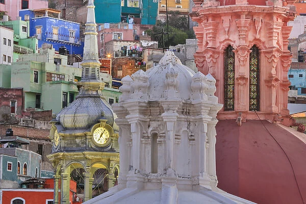 Mexico, Guanajuato. Colorful houses and church domes