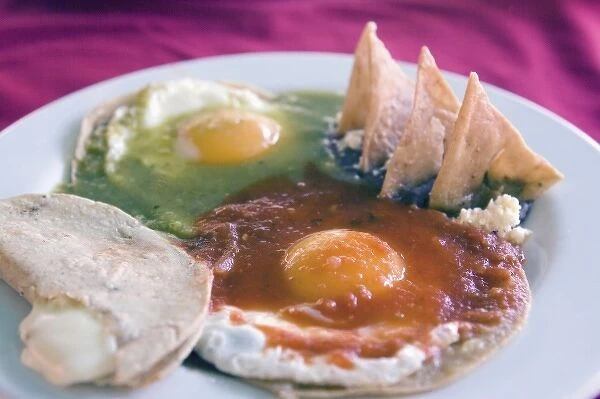 Mexico, Guanajuato. Eggs divorciado (divorced) as served in a downtown