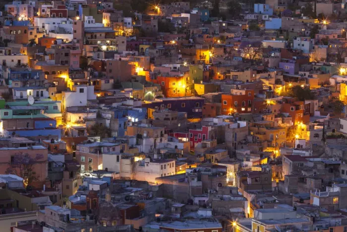 Framed Print : Mexico, Guanajuato. Street lights add ambience to this twilight village scene Framed Print : Mexico, Guanajuato. Street lights add ambience to this twilight village scene