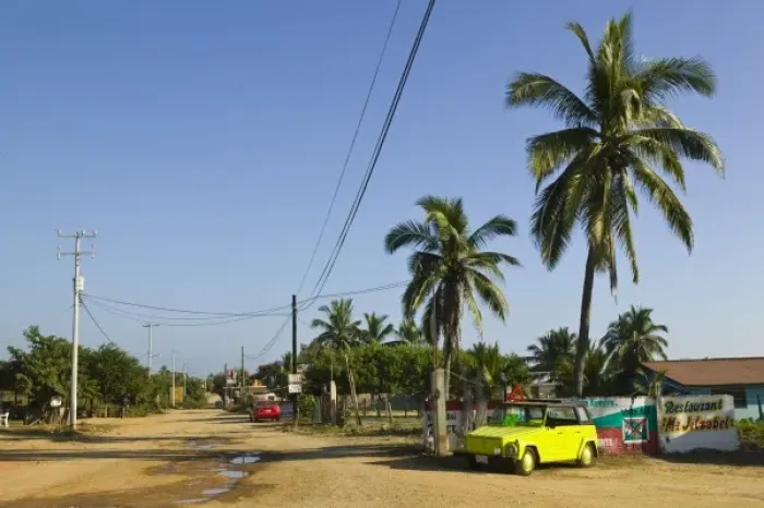 Framed Print : Mexico, Guerrero, Troncones. Downtown Troncones & Volkswagen Thing Car