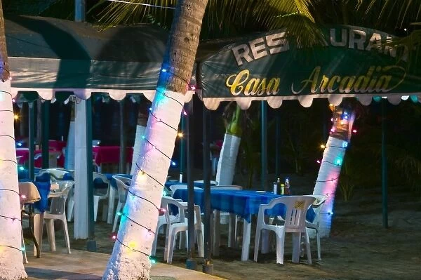 Mexico, Guerrero, Zihuatanejo. Beachside Cafe  /  Playa Municipal  /  Evening