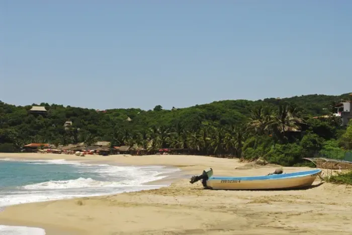 Framed Print : Mexico, Mazunte, view of a nautical vessel moored on sand at the shore of the beach with trees