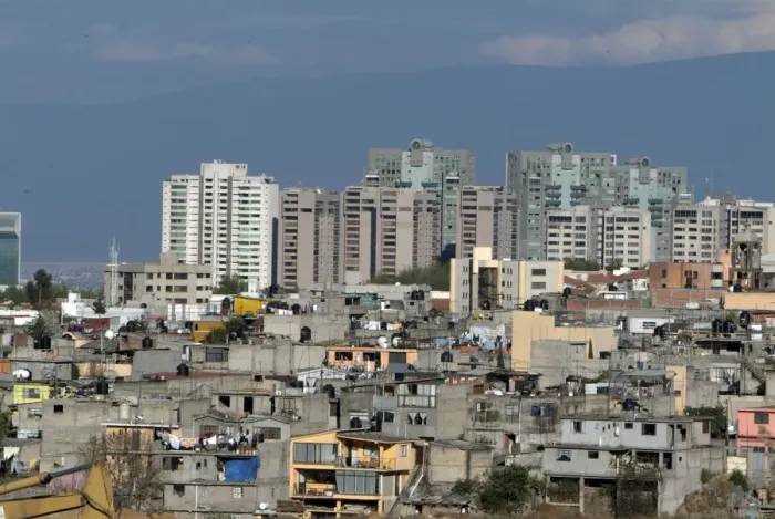 Framed Print : Mexico, Mexico City, Interlomas area towers over nearby shantytowns