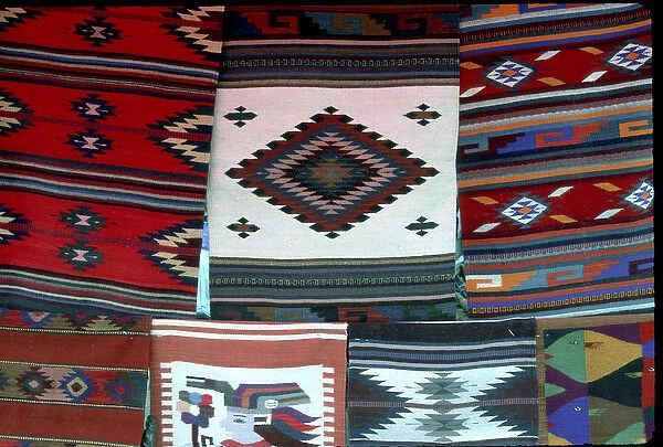 Mexico, Oaxaca. Hand woven blankets for sale in the market