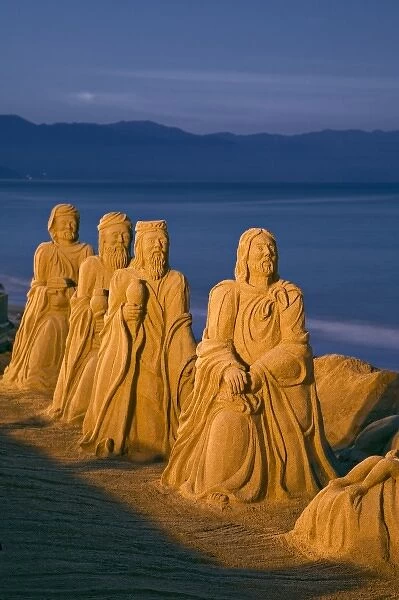Mexico, Puerto Vallarta. Holiday sand sculptures along the Malecon