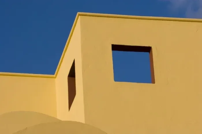 Framed Print : Mexico, San Miguel de Allende. Angled roofline of yellow building against blue sky Framed Print : Mexico, San Miguel de Allende. Angled roofline of yellow building against blue sky