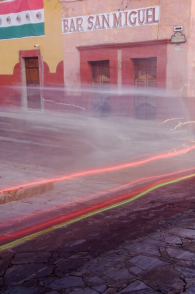 Mexico, San Miguel de Allende, Bar San Miguel entrance with car taillights. Credit as