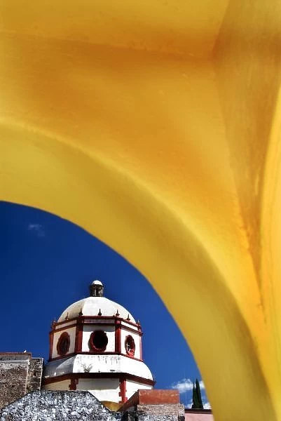 Mexico, San Miguel de Allende. Church framed with yellow arch. Credit as: Nancy Rotenberg