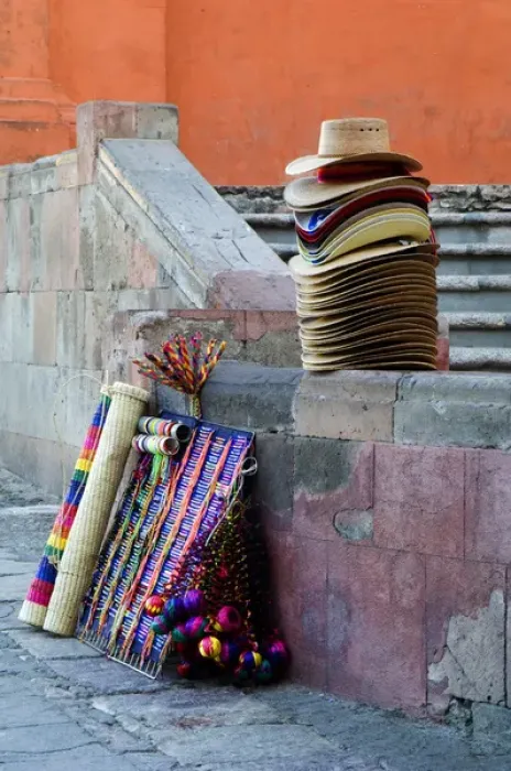 Framed Print : Mexico, San Miguel de Allende, Hats and other items for sale on street. Credit as Framed Print : Mexico, San Miguel de Allende, Hats and other items for sale on street. Credit as