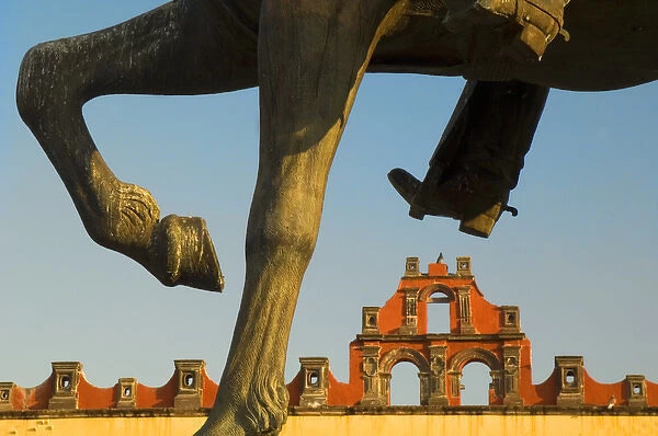 Mexico, San Miguel de Allende, Horse statue framing building. Credit as: Nancy Rotenberg