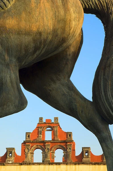 Mexico, San Miguel de Allende, Horse statue framing building. Credit as: Nancy Rotenberg