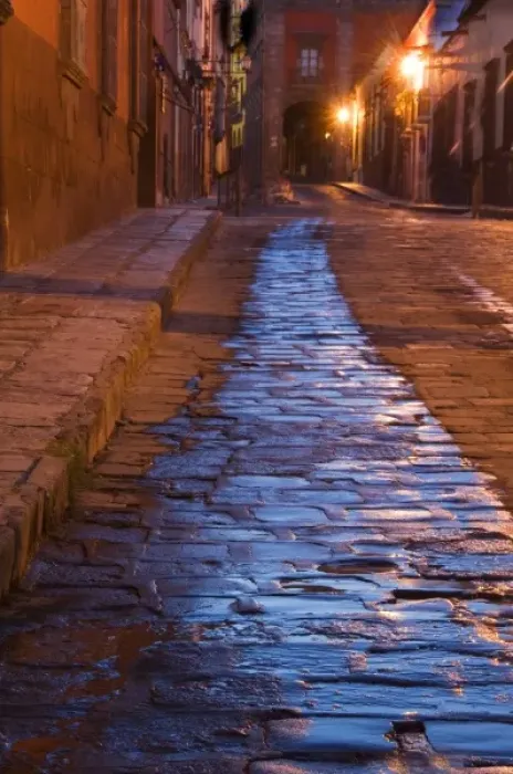 Framed Print : Mexico, San Miguel de Allende. Lanterns reflect on pre-dawn cobblestone street. Credit as