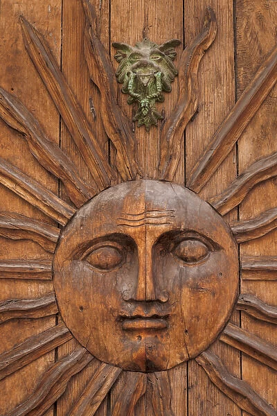 Mexico, San Miguel de Allende. Sun carving on doorway