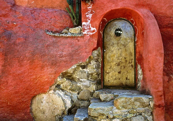 Mexico, San Miguel de Allende. Weathered house door and exterior