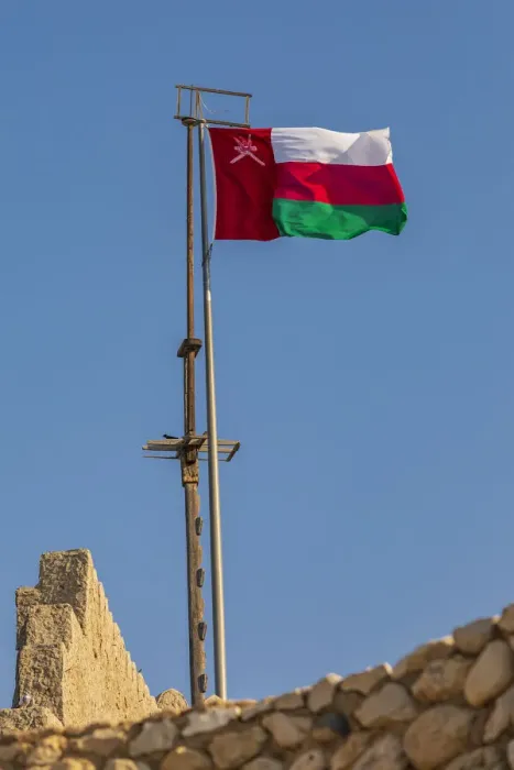 Framed Print : Middle East, Arabian Peninsula, Oman, Muscat, Muttrah. Omani flag flying in Muttrah Framed Print : Middle East, Arabian Peninsula, Oman, Muscat, Muttrah. Omani flag flying in Muttrah